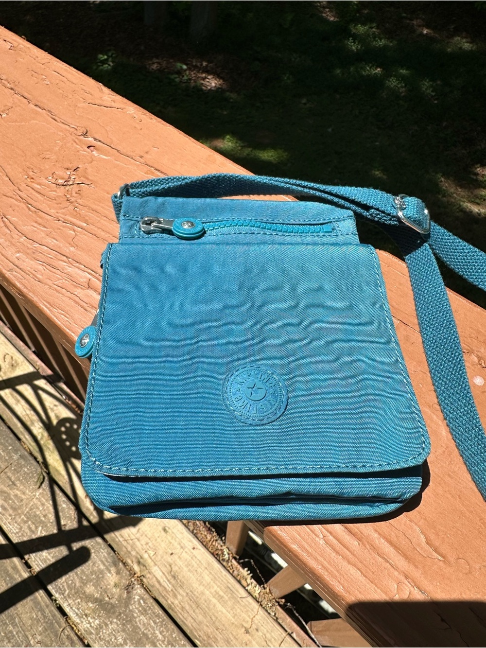 Kipling teal nylon crossbody purse